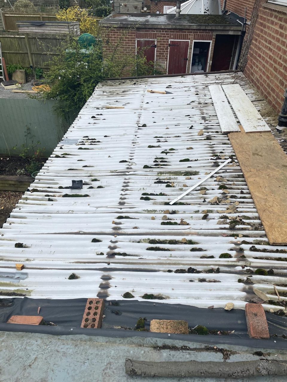 Roofing work in progress by All Pro Contractors
