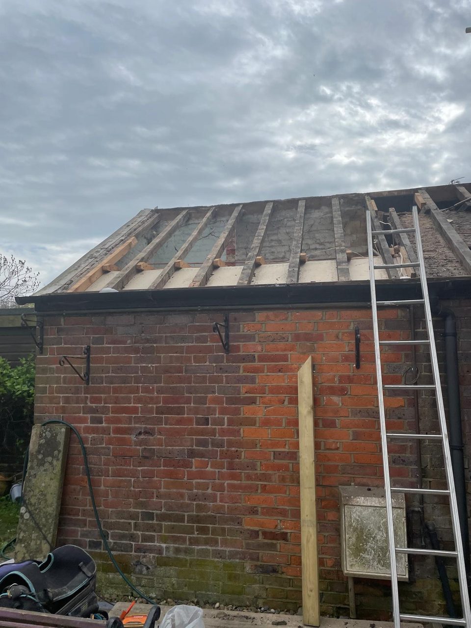 Roofing work in progress by All Pro Contractors