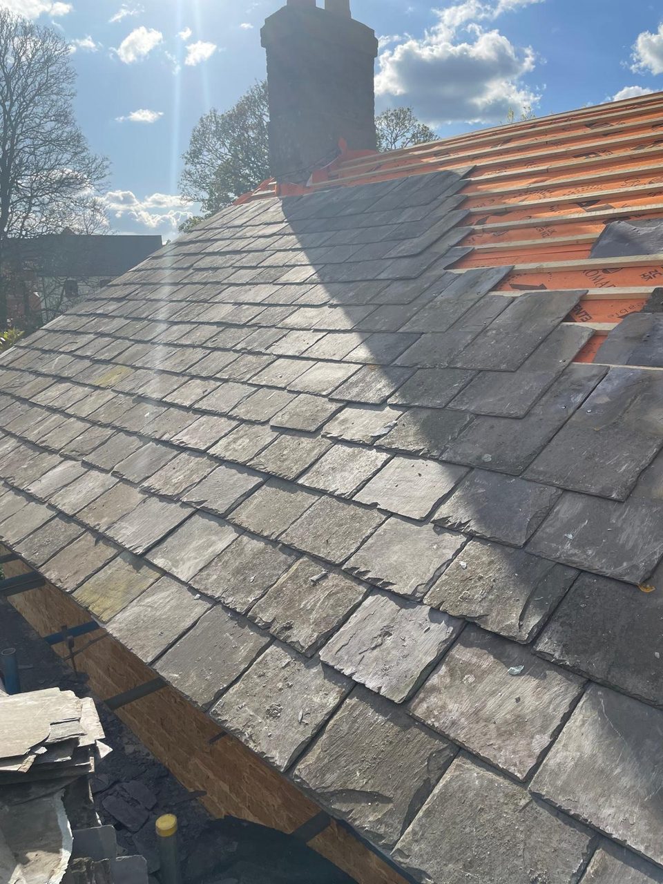 Roofing work in progress by All Pro Contractors