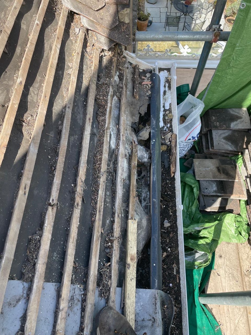 Roofing work in progress by All Pro Contractors