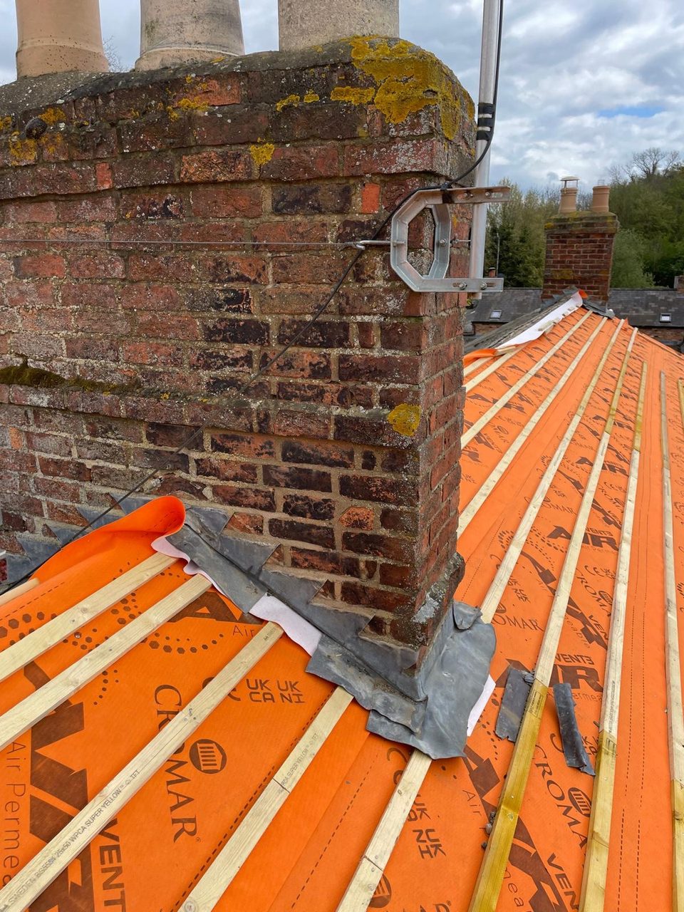 Roofing work in progress by All Pro Contractors