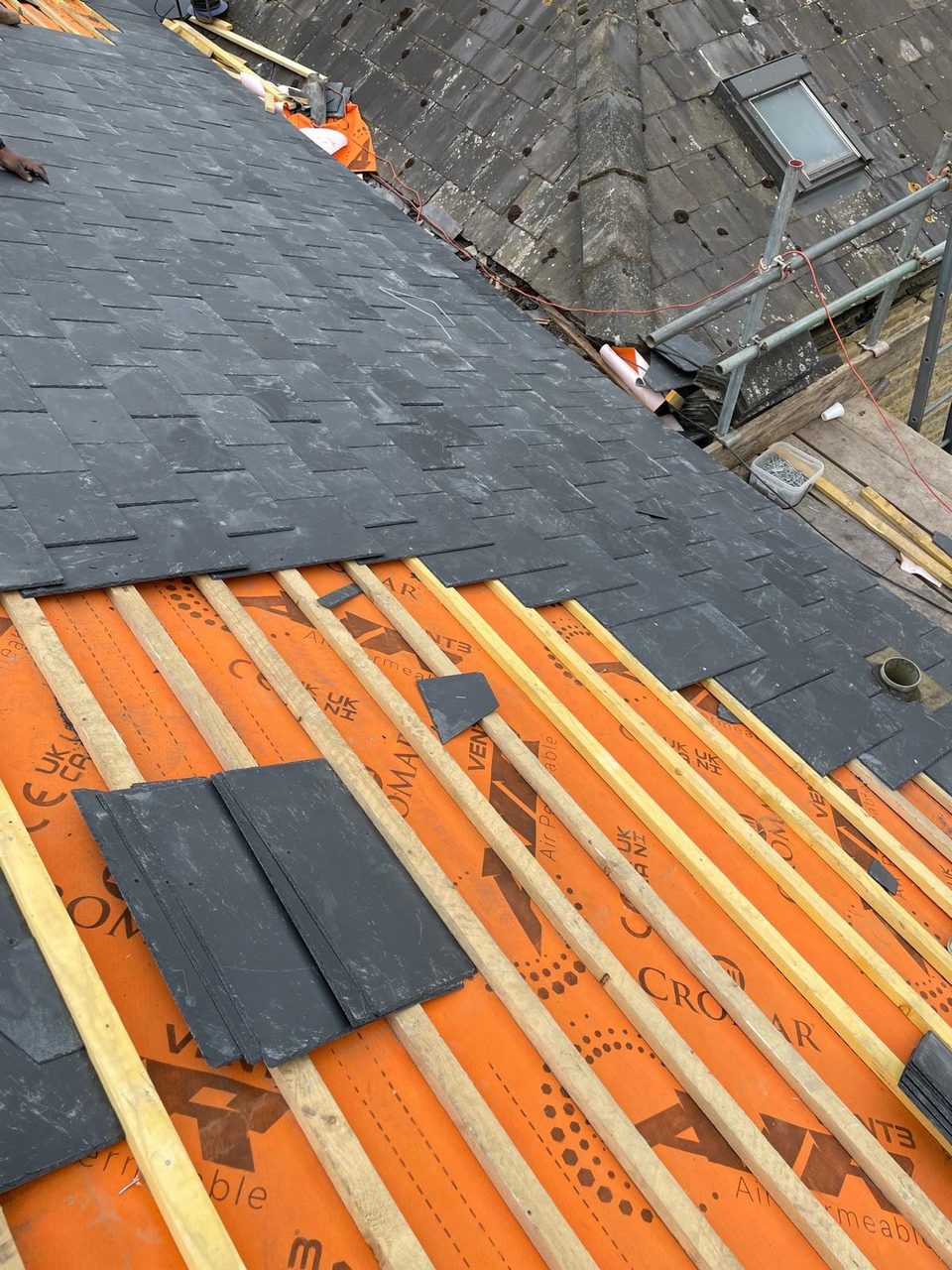 Roofing work in progress by All Pro Contractors
