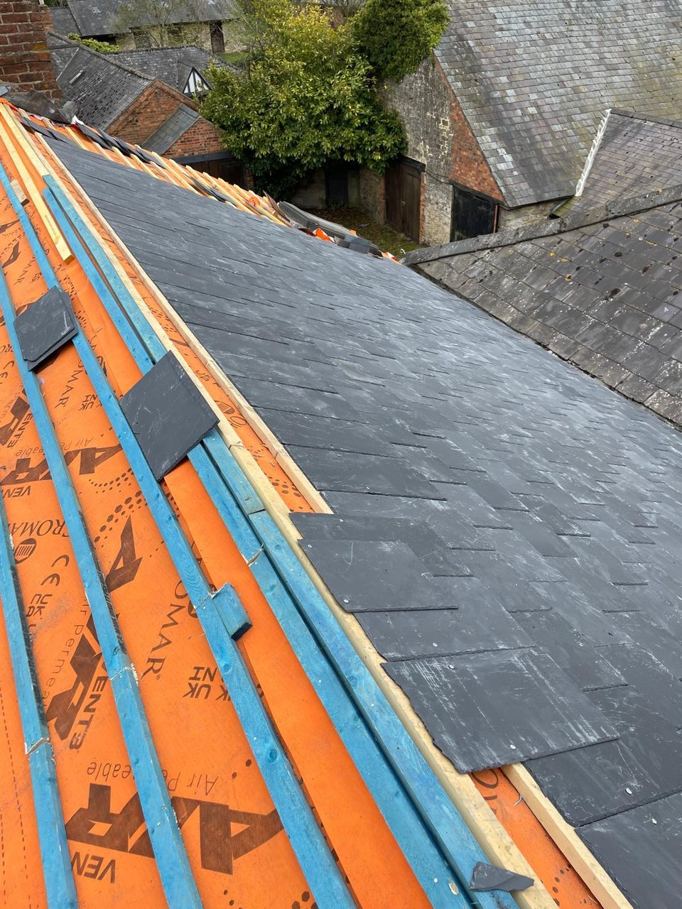 Roofing work in progress by All Pro Contractors