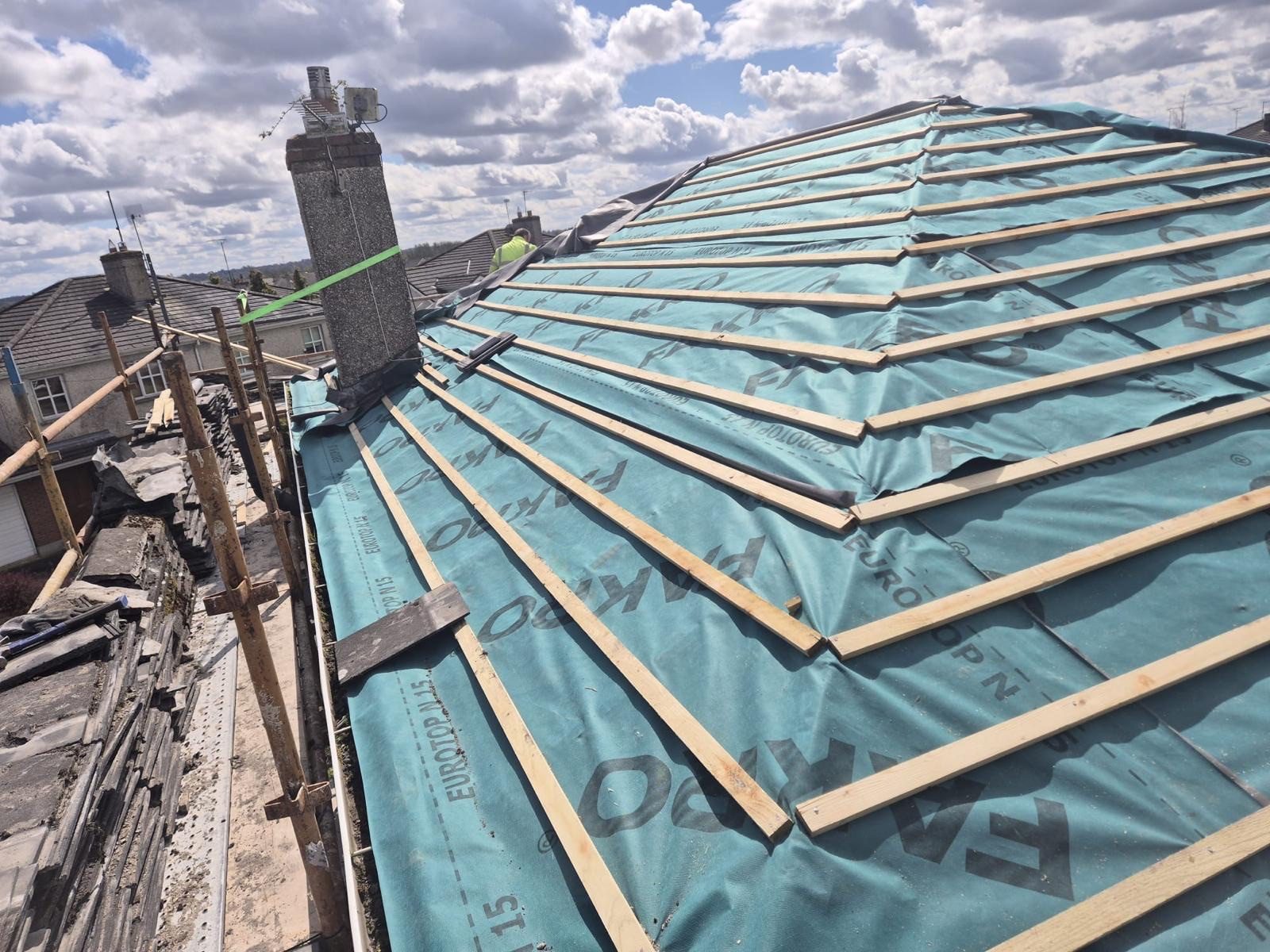 Roofing work in progress by All Pro Contractors
